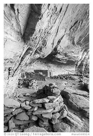 Fireplace and other structures in alcove, Perfect Kiva complex. Bears Ears National Monument, Utah, USA (black and white)