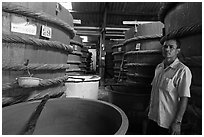 Worker in fish sauch factory, Duong Dong. Phu Quoc Island, Vietnam ( black and white)