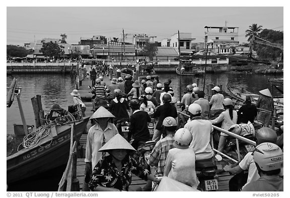 Crowd crossing the mobile bridge, Duong Dong. Phu Quoc Island, Vietnam (black and white)