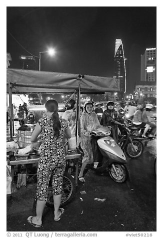 Street food stand at night. Ho Chi Minh City, Vietnam (black and white)