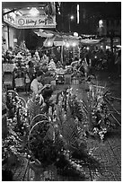 Flower and vegetable stores at night. Ho Chi Minh City, Vietnam (black and white)