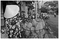 Durians for sale on street. Ho Chi Minh City, Vietnam (black and white)