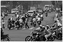 Motorcyle traffic on large avenue. Ho Chi Minh City, Vietnam ( black and white)