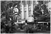 Fighter plane used by renegate South Vietnamese pilot to bomb Presidential Palace. Ho Chi Minh City, Vietnam (black and white)