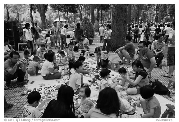 Babies and toddlers, Cong Vien Van Hoa Park. Ho Chi Minh City, Vietnam (black and white)