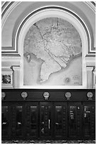 Phone booths and colonial-area map, Central Post Office. Ho Chi Minh City, Vietnam (black and white)