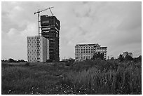 High rise towers in construction on former swampland, Phu My Hung, district 7. Ho Chi Minh City, Vietnam ( black and white)