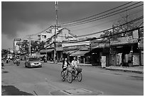 Street with moonson clouds, district 7. Ho Chi Minh City, Vietnam ( black and white)