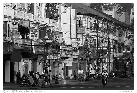Facades of colonial-area townhouses. Ho Chi Minh City, Vietnam (black and white)