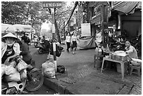 Street food vendors. Ho Chi Minh City, Vietnam (black and white)
