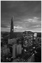 Bitexco Tower and city lights at sunset. Ho Chi Minh City, Vietnam ( black and white)