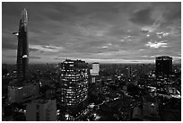 Bitexco Tower and city skyline at sunset. Ho Chi Minh City, Vietnam ( black and white)