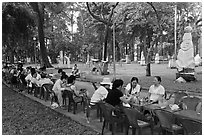 Outdoor refreshments served in front of sculpture garden, Cong Vien Van Hoa Park. Ho Chi Minh City, Vietnam ( black and white)