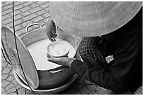 Soft tofu pot and bown. Ho Chi Minh City, Vietnam (black and white)