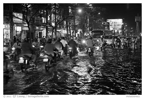 Flooded street and light reflections. Ho Chi Minh City, Vietnam (black and white)