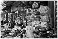 Shop selling dragon heads used for traditional dancing. Cholon, Ho Chi Minh City, Vietnam ( black and white)