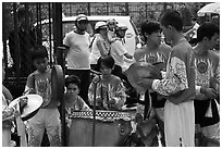 Dragon dance band made of children, Thien Hau Pagoda. Cholon, District 5, Ho Chi Minh City, Vietnam (black and white)