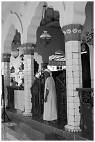 Muslim man in worship attire, Cholon Mosque. Cholon, District 5, Ho Chi Minh City, Vietnam (black and white)