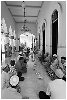 Men sitting in gallery, Cholon Mosque. Cholon, District 5, Ho Chi Minh City, Vietnam (black and white)