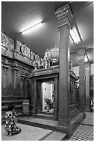 Worshipping inside Mariamman Hindu Temple. Ho Chi Minh City, Vietnam ( black and white)