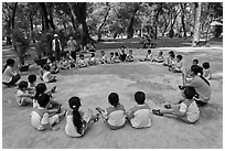 Uniformed schoolchildren, Cong Vien Van Hoa Park. Ho Chi Minh City, Vietnam ( black and white)