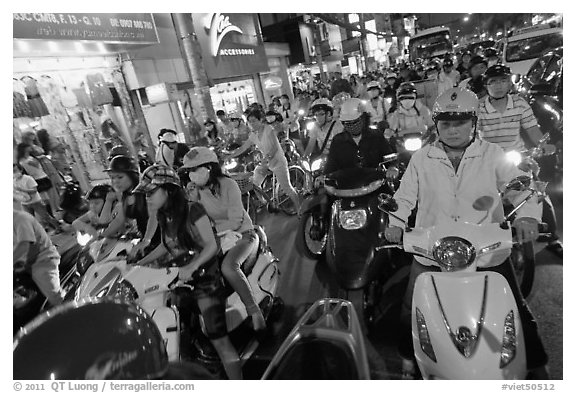 Street filled with motorcycles at rush hour. Ho Chi Minh City, Vietnam