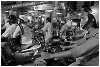 Motorcyle riders in traffic gridlock. Ho Chi Minh City, Vietnam ( black and white)
