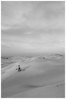 Sand dune landscape with figure. Mui Ne, Vietnam ( black and white)