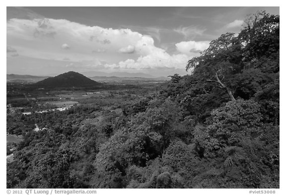 Mountain forest and plain dotted with hills. Ta Cu Mountain, Vietnam (black and white)