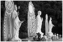 Three Buddhist statues. Ta Cu Mountain, Vietnam ( black and white)