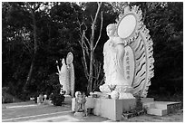 Two Buddhist statues. Ta Cu Mountain, Vietnam ( black and white)