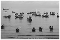 Fishing boats moored at the fishing beach. Mui Ne, Vietnam ( black and white)