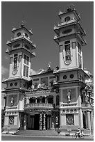 Great Temple of Cao Dai facade. Tay Ninh, Vietnam (black and white)