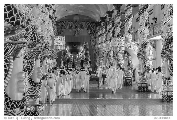 Cao Dai followers during a service inside Holy See. Tay Ninh, Vietnam (black and white)
