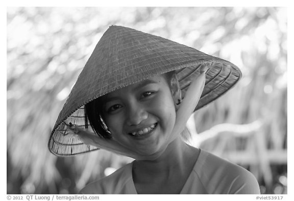 Portrait of girl with conical hat, Phoenix Island. My Tho, Vietnam