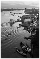 Boats and riverfront from above at dawn. Can Tho, Vietnam ( black and white)