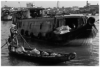 Canoe and barge, Cai Rang floating market. Can Tho, Vietnam (black and white)