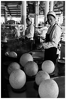 Crispy spherical shells beeing prepared. Mekong Delta, Vietnam ( black and white)