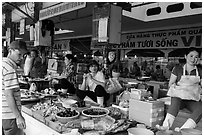 Vendors in Ben Thanh market. Ho Chi Minh City, Vietnam (black and white)