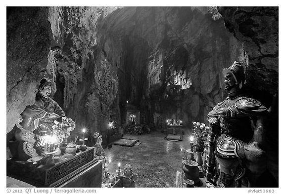 Guardian deities at the entrance of Huyen Khong cave. Da Nang, Vietnam (black and white)