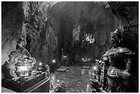Guardian deities at the entrance of Huyen Khong cave. Da Nang, Vietnam ( black and white)