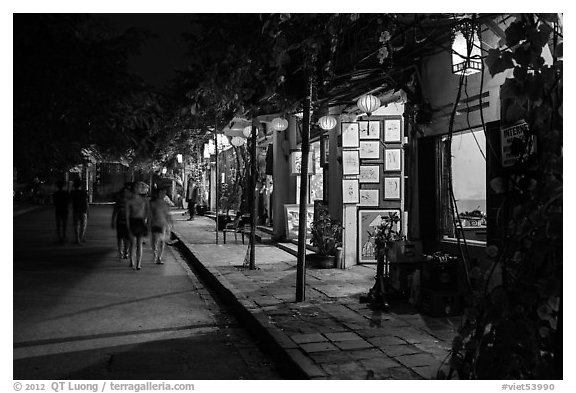 Street lined with art galleries by night. Hoi An, Vietnam (black and white)