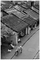 Old houses with tile rooftops and street from above. Hoi An, Vietnam ( black and white)