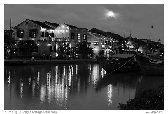 Moonrise over houses and river. Hoi An, Vietnam (black and white)
