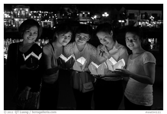 Group of women holding candles. Hoi An, Vietnam