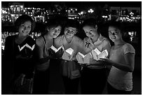 Group of women holding candles. Hoi An, Vietnam ( black and white)