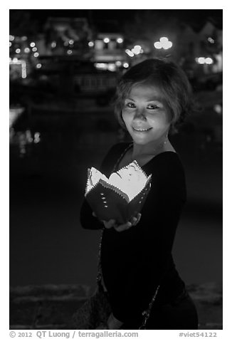 Young woman with candle box. Hoi An, Vietnam (black and white)