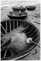 Coracle boats with fishing gear. Da Nang, Vietnam (black and white)