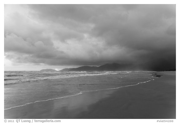 Stormy sunrise on beach. Vietnam (black and white)