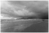Stormy sunrise on beach. Vietnam ( black and white)